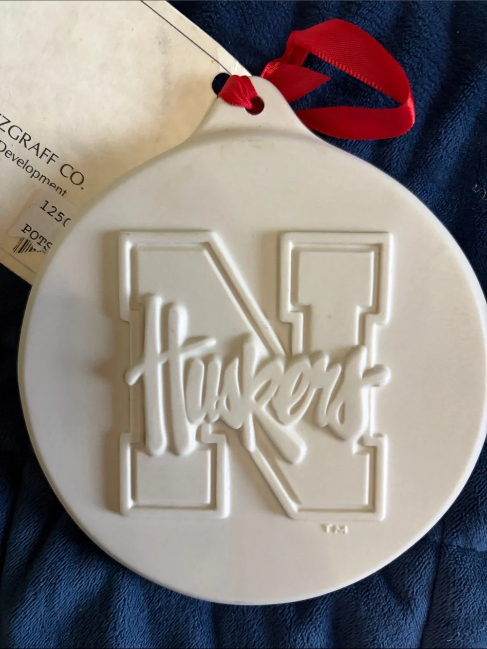 Pfaltzgraff White Nebraska Huskers Cookie Mold with Red Ribbon